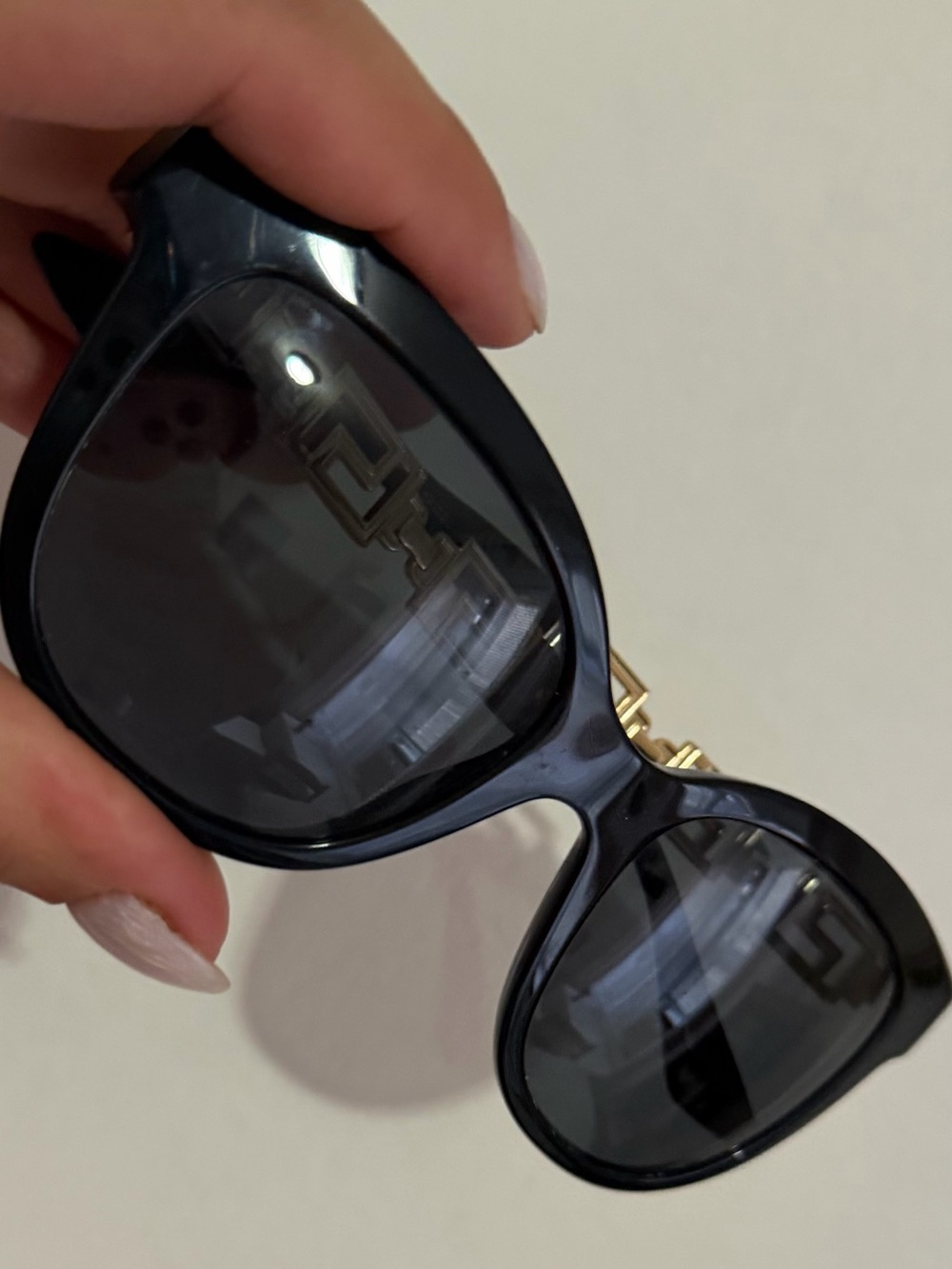 VERSACE black sunglasses with gold logo detailing